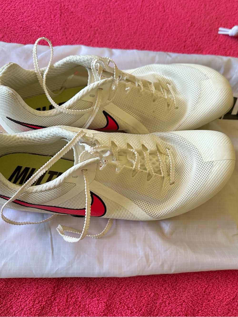 Nike White Track Spikes with Pink Swoosh